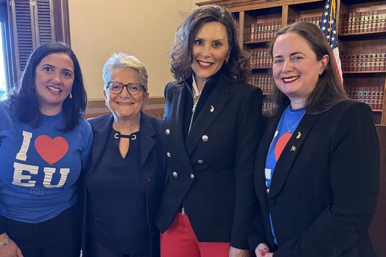 4 women standing together